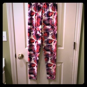 A & D Purple, cream, and orange leggings- S/M